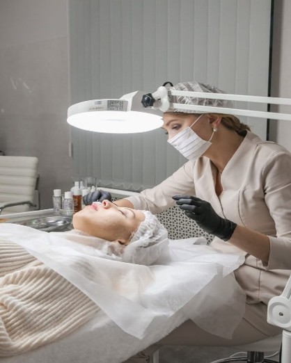 Medical professionals learning facial aesthetics and skin analysis during advanced fellowship training